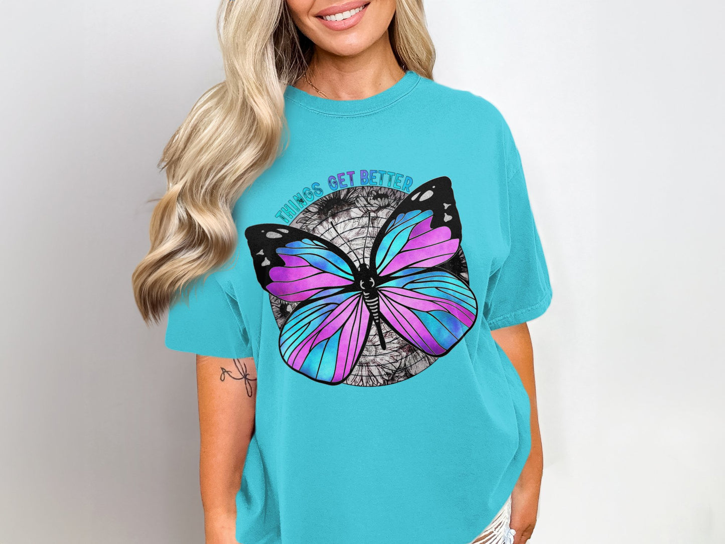 Vibrant Butterfly Graphic T-shirt with Positive Message