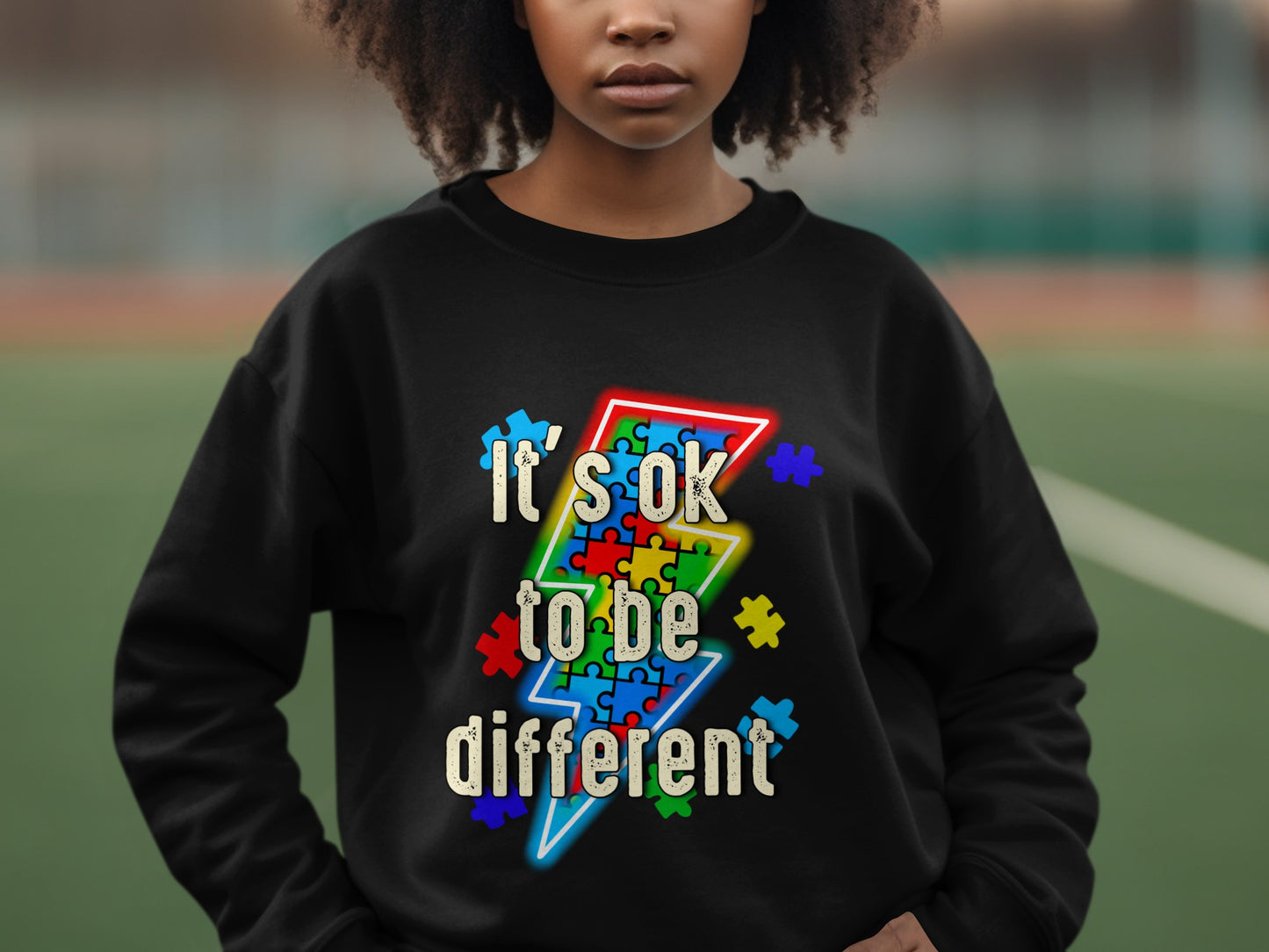 It's ok to be different slogan sweater
