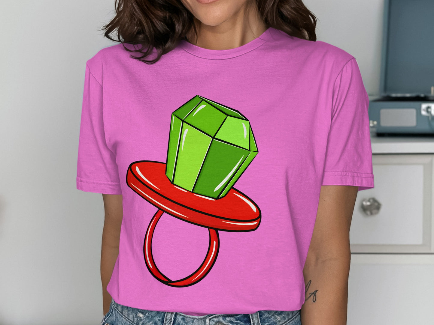 Vibrant Pink T-Shirt with Cartoon Gemstone Design