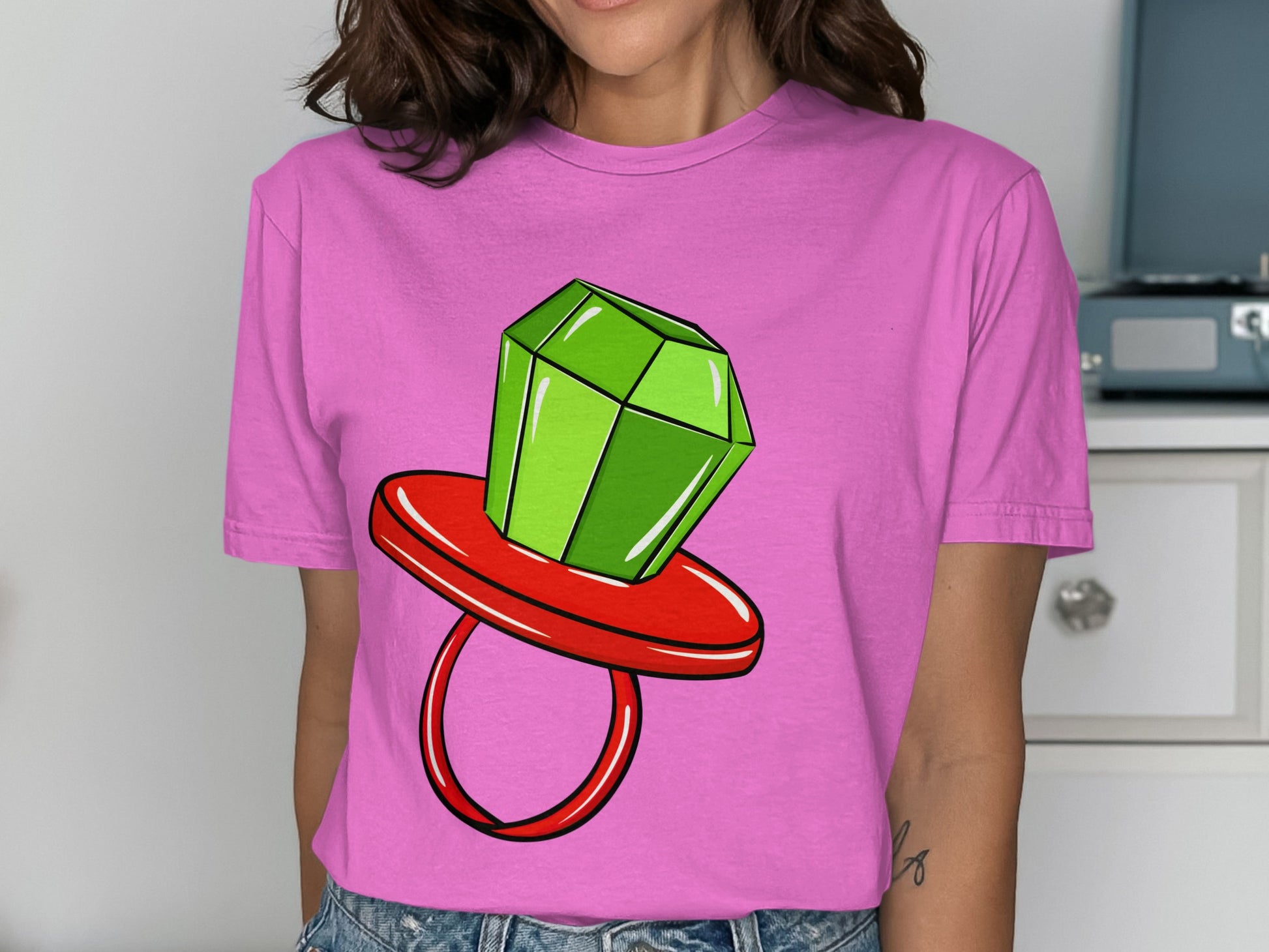Vibrant Pink T-Shirt with Cartoon Gemstone Design