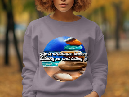 Life is a balance between holding on and letting go sweatshirt