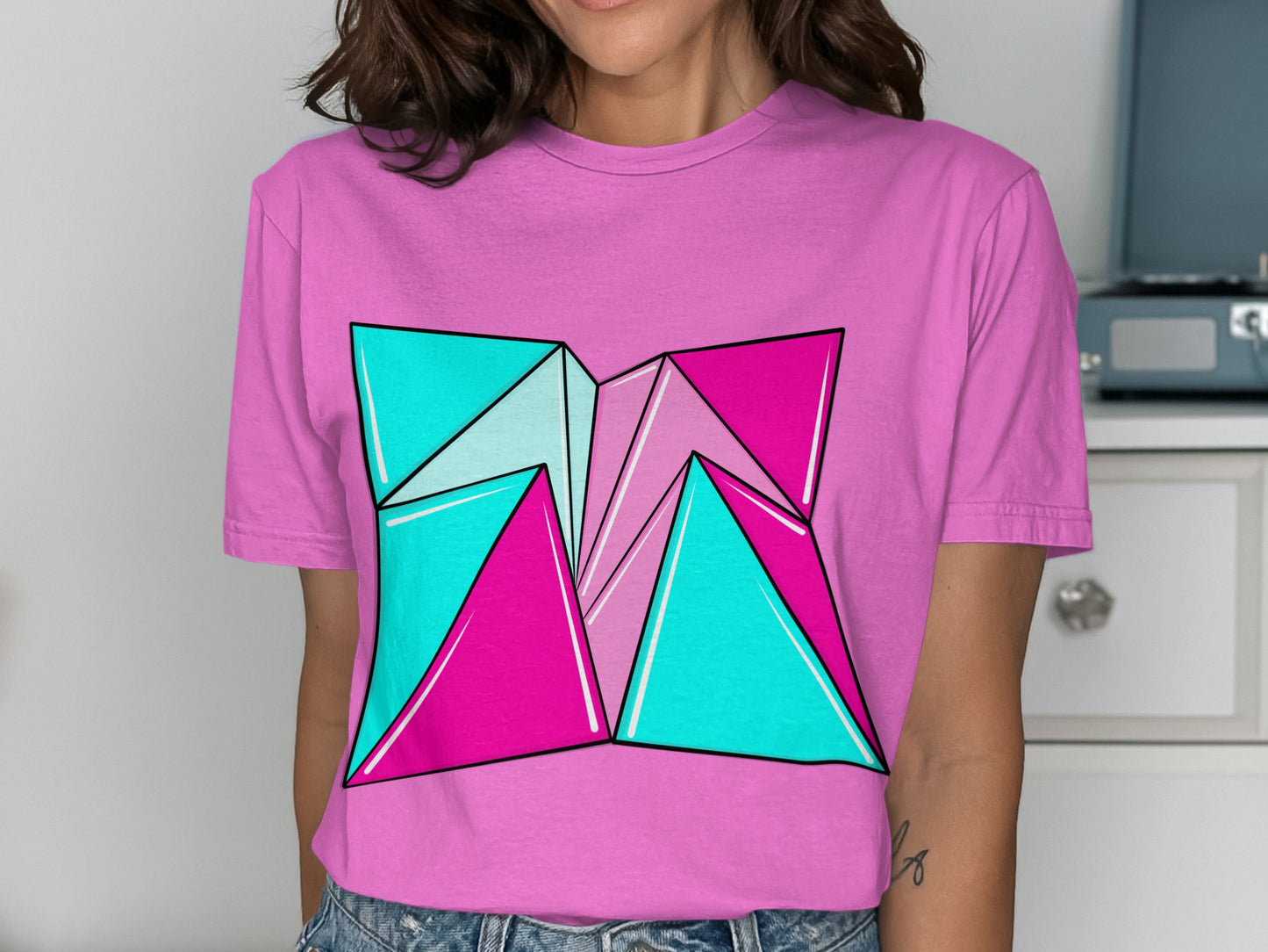 Vibrant Geometric Design on Pink Tee Product