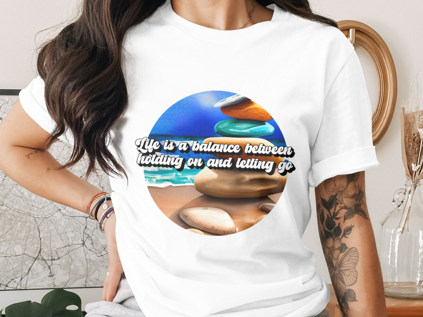Life is a balance between holding on and letting go t-shirt