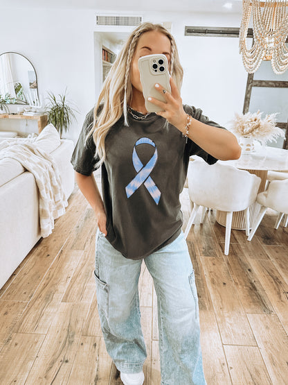 Casual Black Tee with Unique Blue Ribbon Design