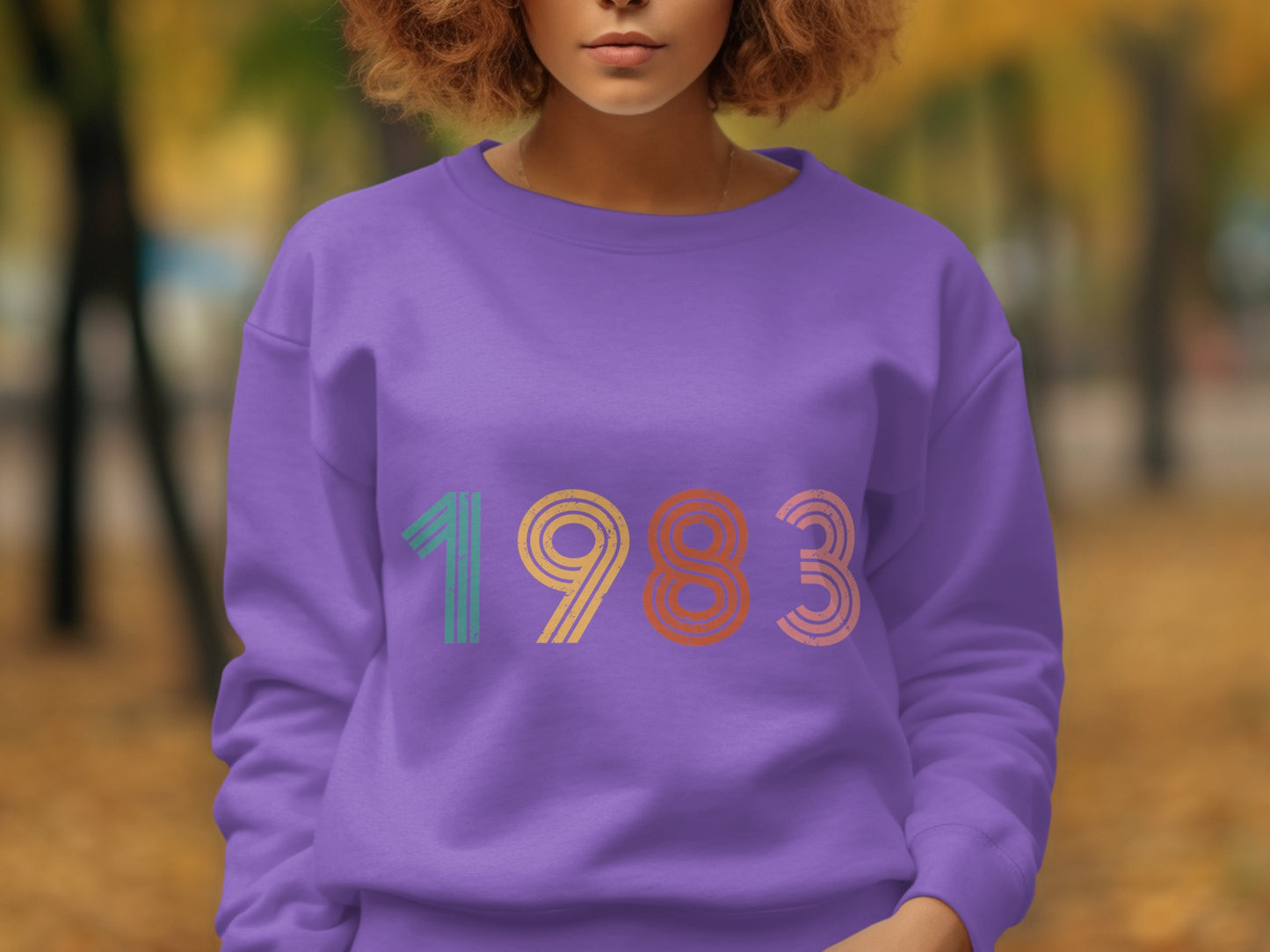 Vibrant Purple Sweatshirt Featuring 1983 Year Design