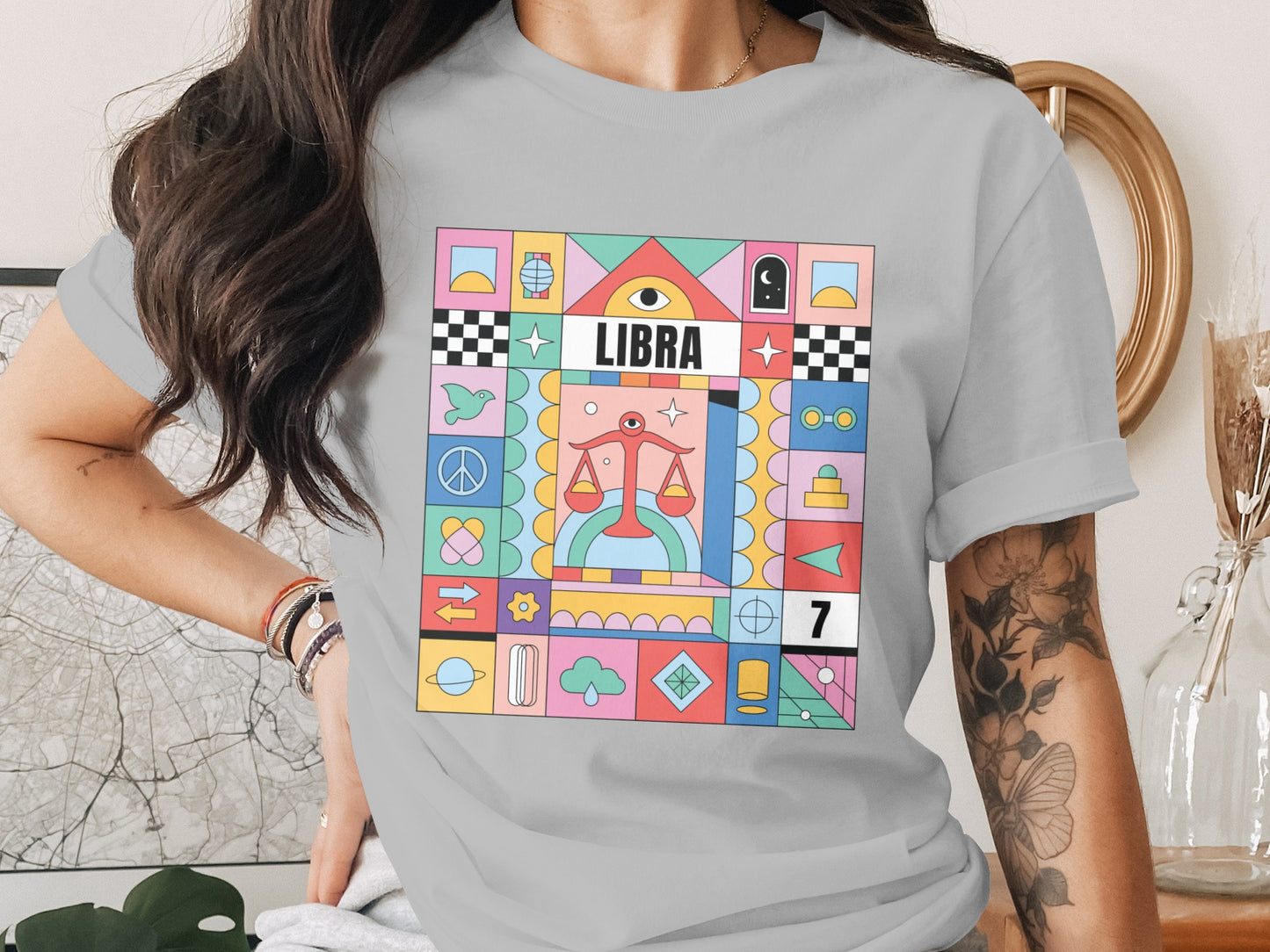 Vibrant colorful design featuring Libra graphic tee