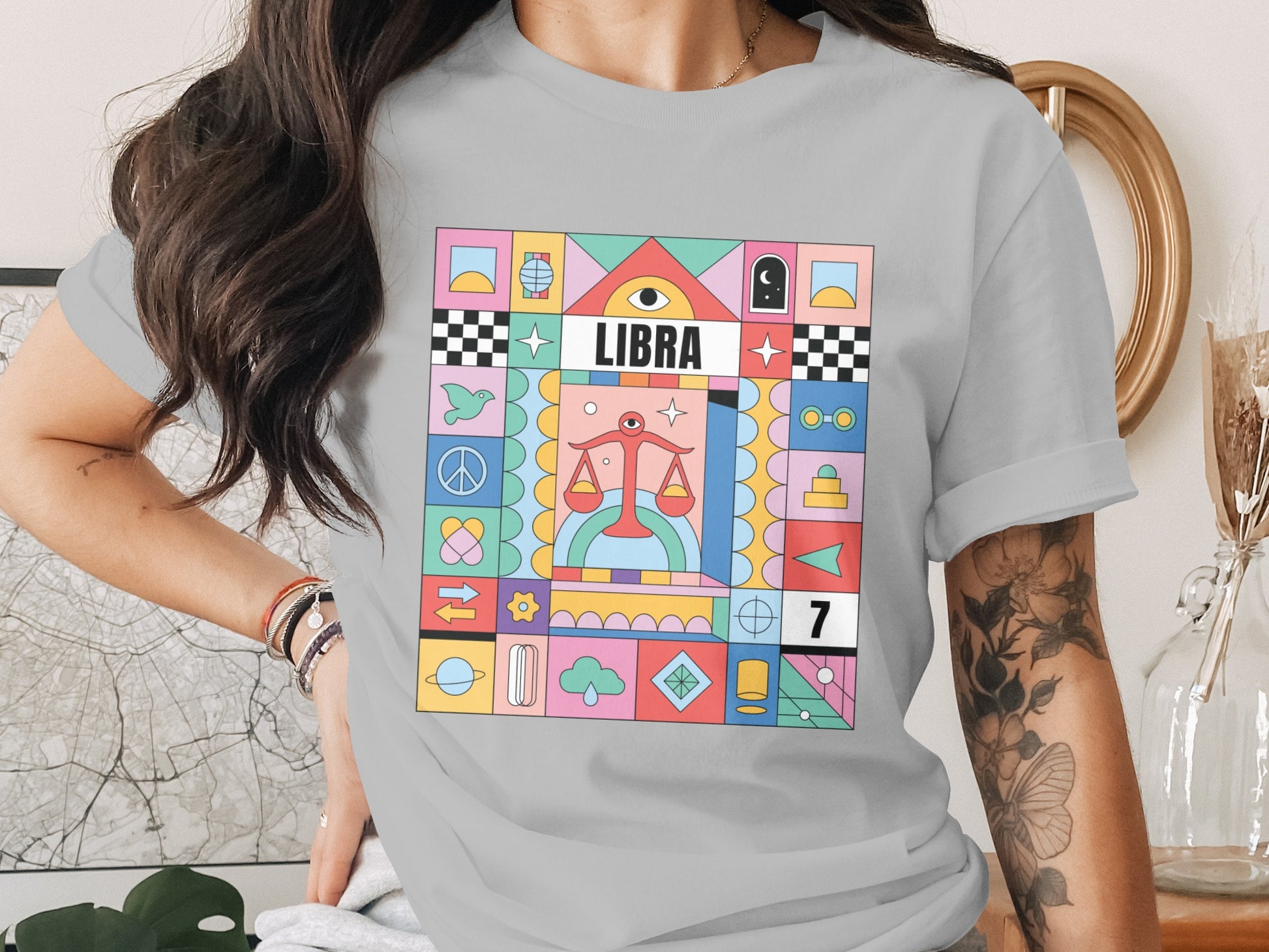 Vibrant colorful design featuring Libra graphic tee