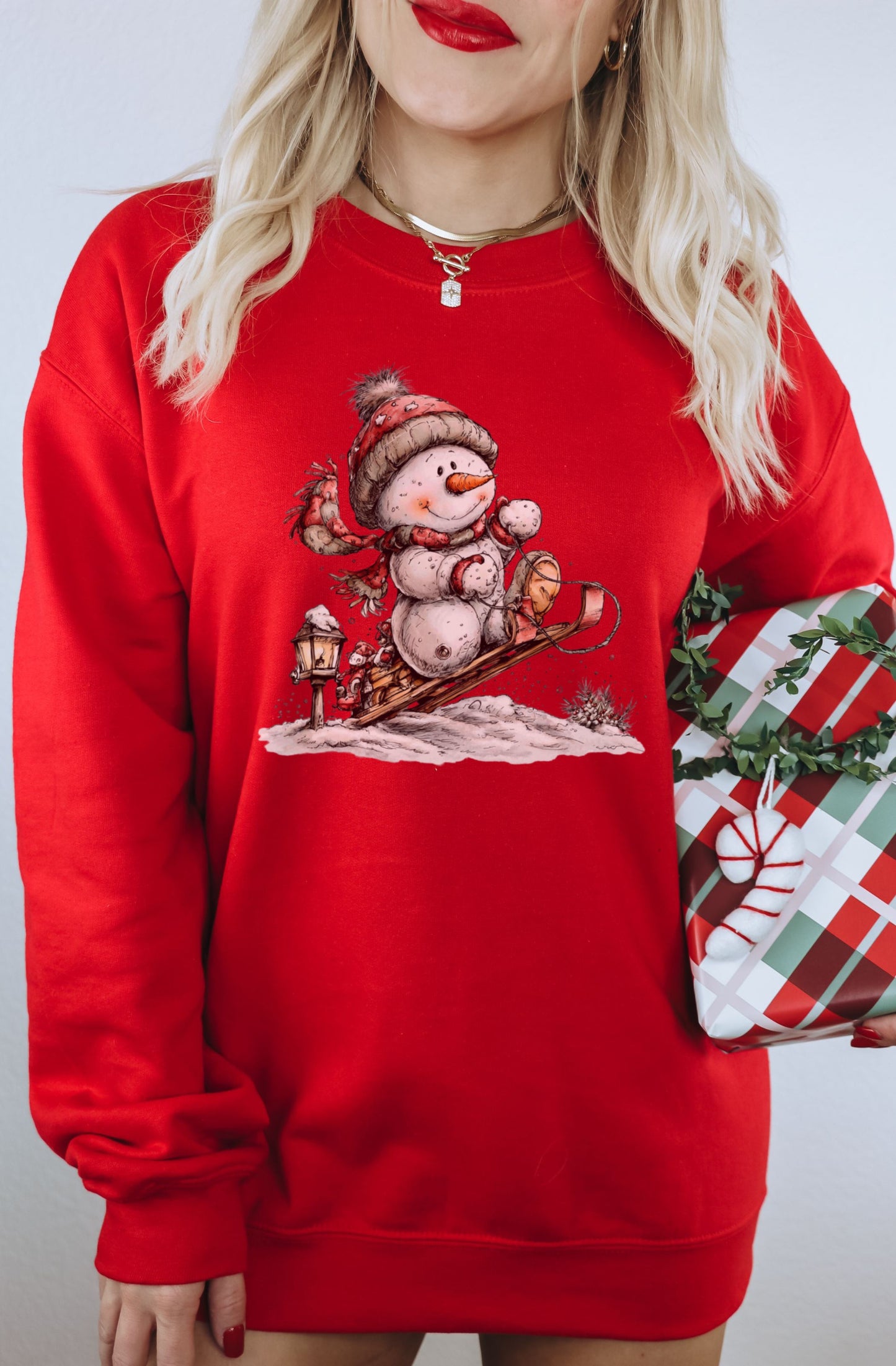 Festive Snowman on Sleigh Graphic Red Sweatshirt