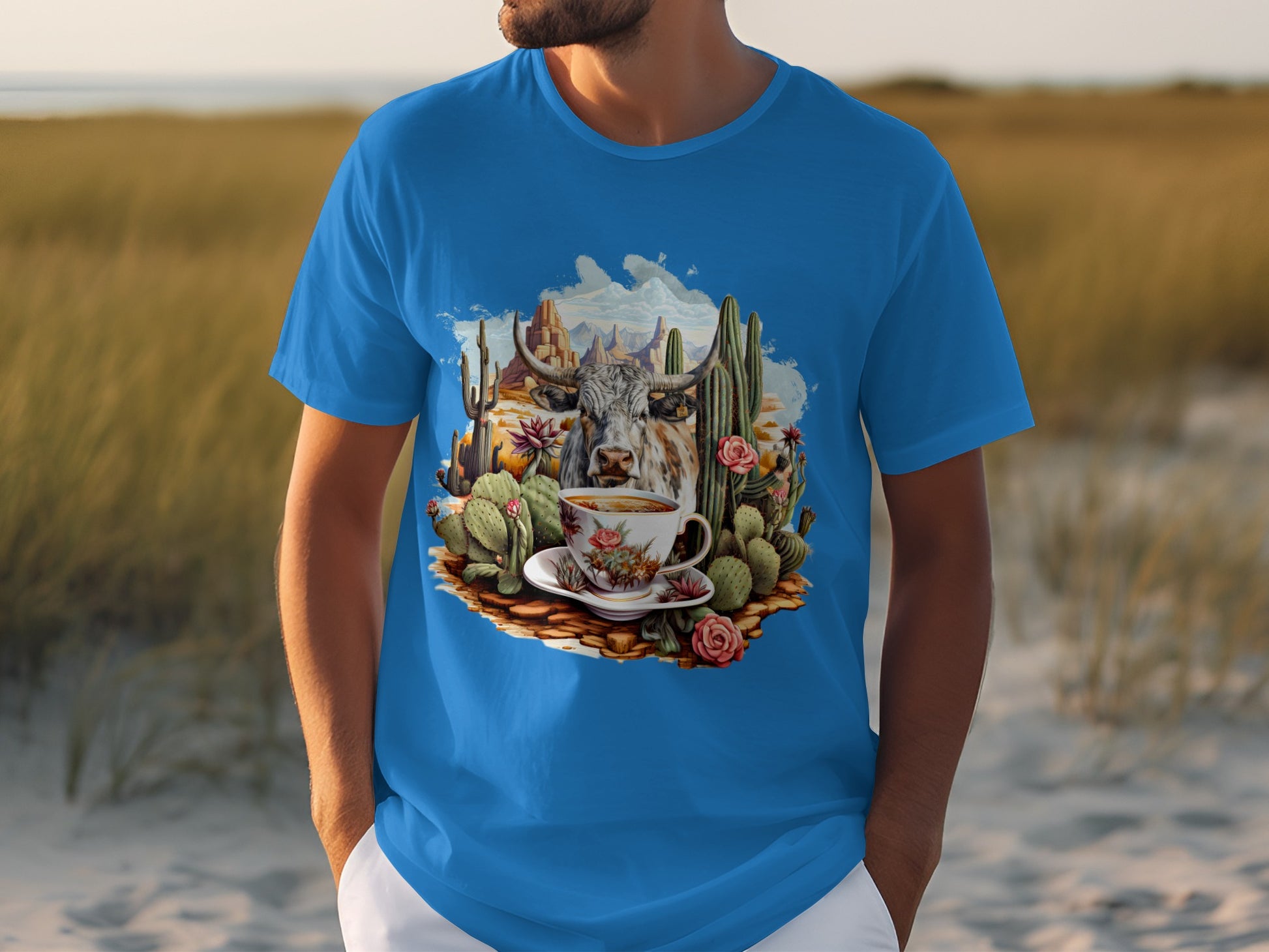 Artistic cow and cactus design on blue t-shirt