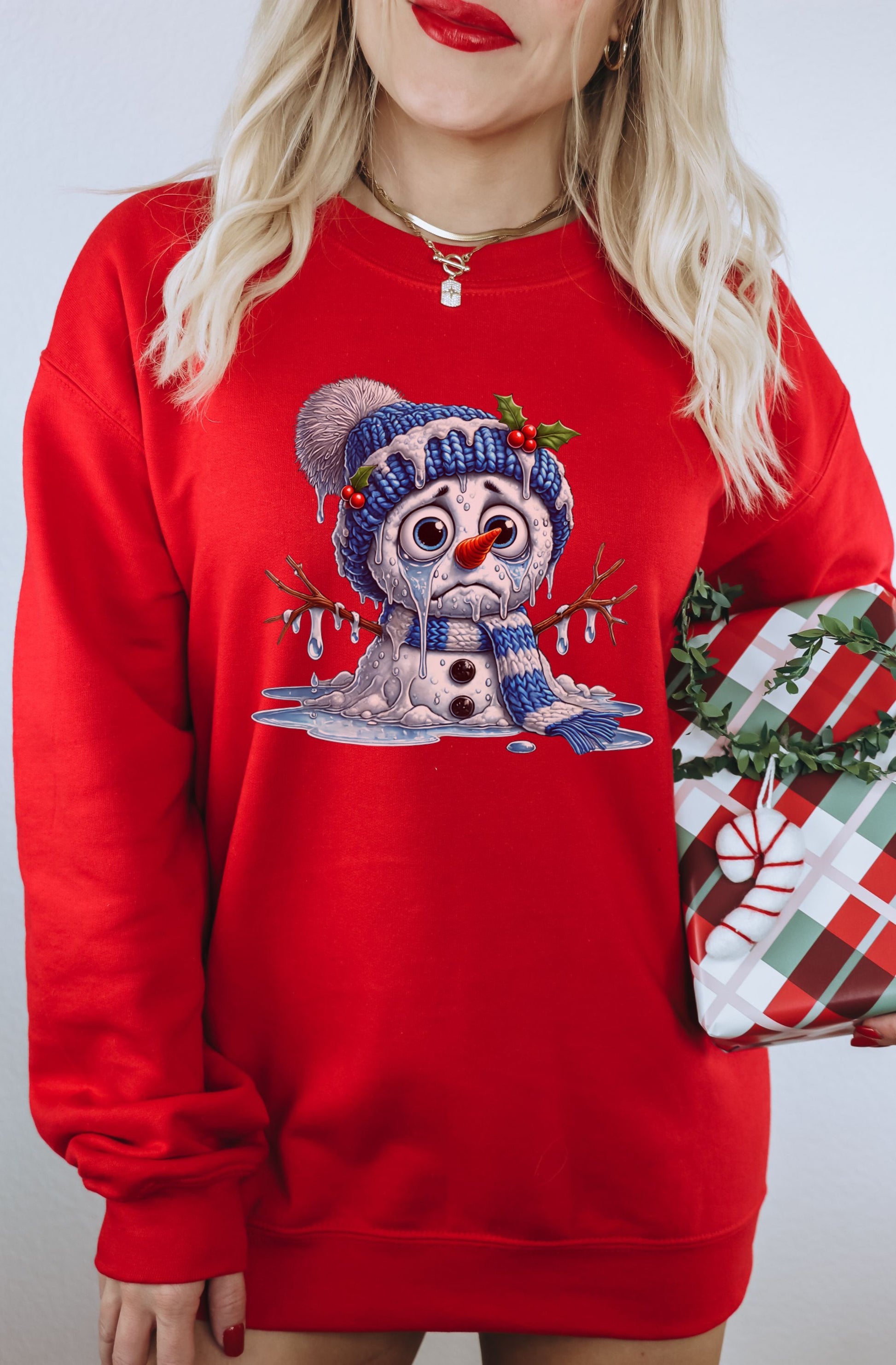 Red Sweatshirt with Festive Melting Snowman Design