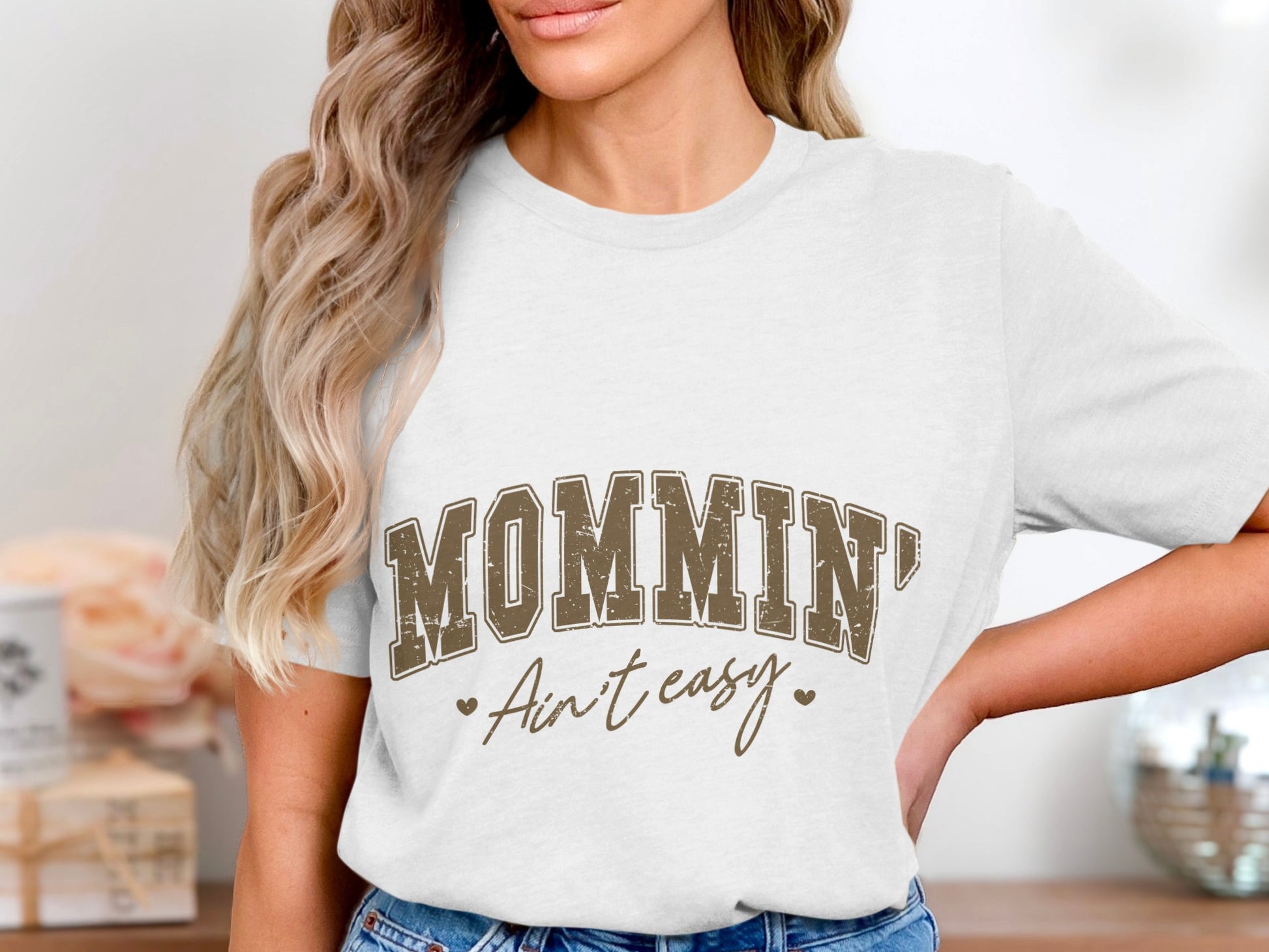 Mommin' Ain't Easy Graphic Tee Product