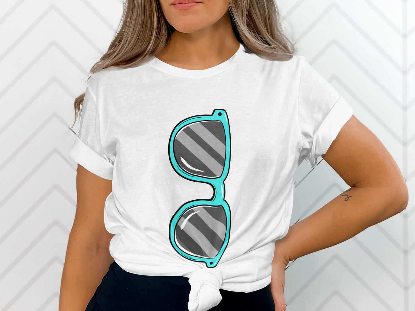 Stylish white tee with oversized turquoise glasses design