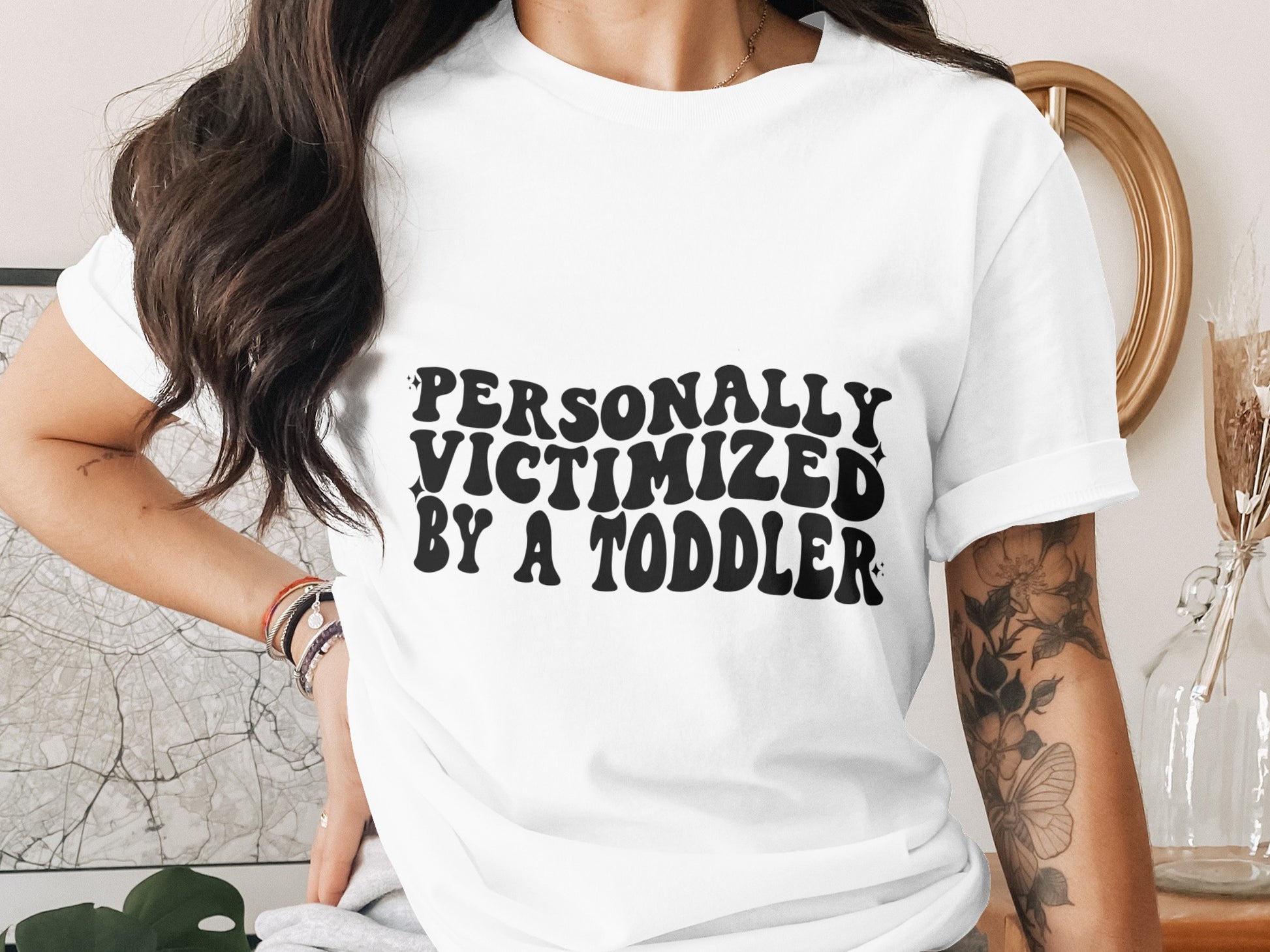 Personally Victimized by a Toddler Slogan Tee