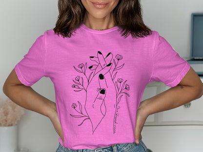 Pink T-Shirt with Black Art of Hand Holding a Flower