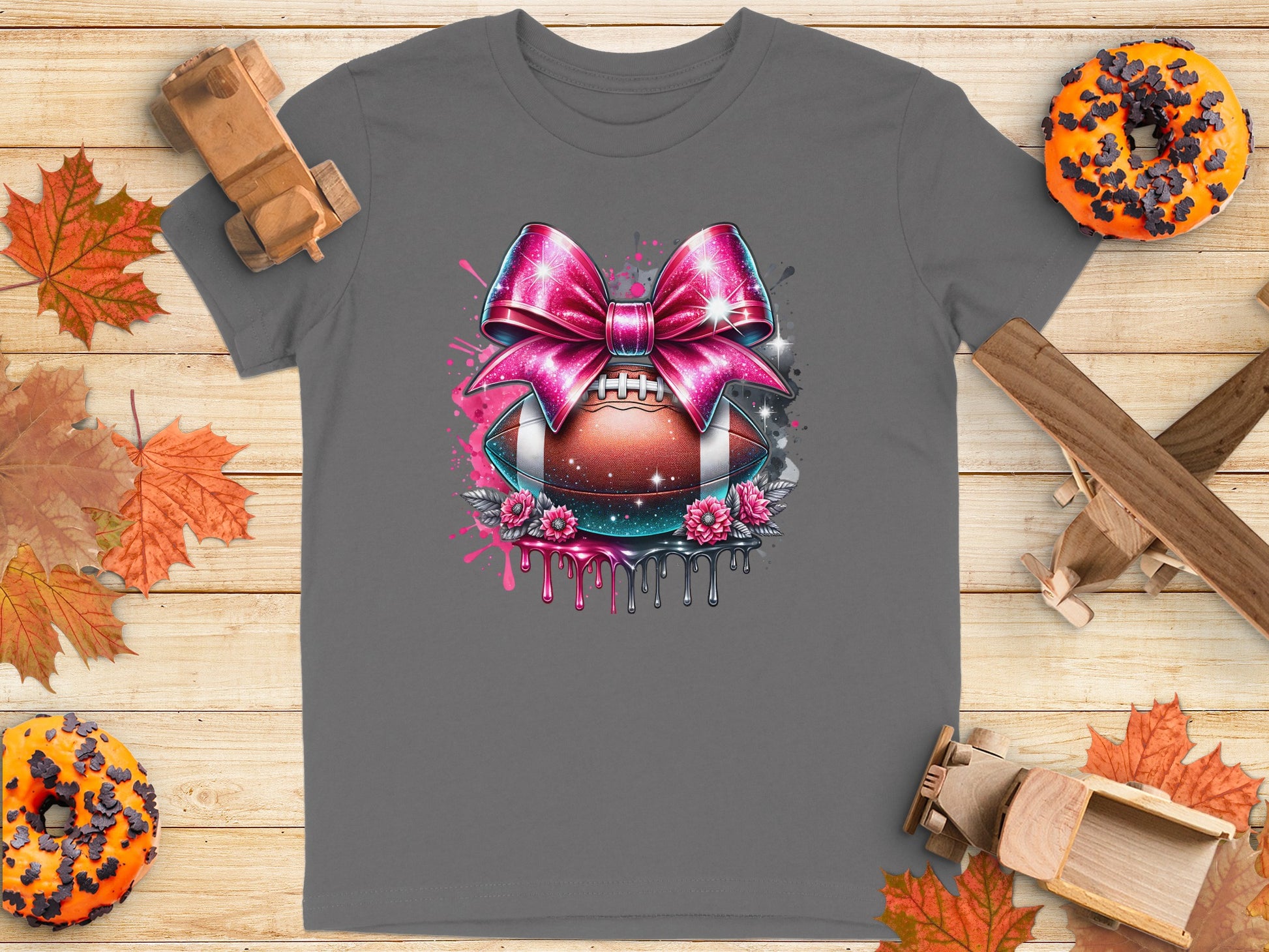 Sparkling Pink Bow Football Graphic T-Shirt product