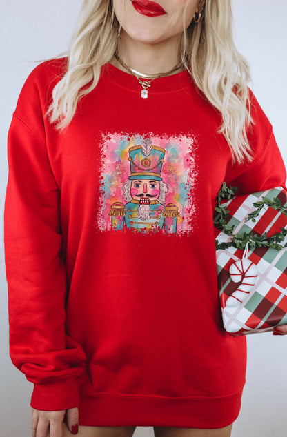 Vibrant Nutcracker Graphic Red Sweater for Festive Season