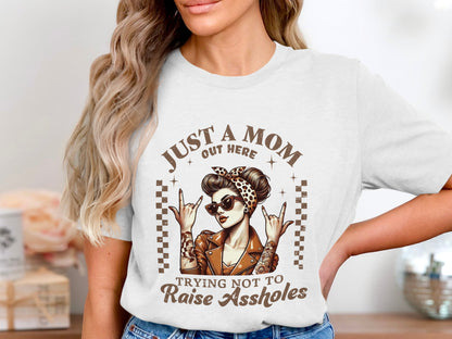 Just a Mom Out Here Trying Not to Raise Assholes Shirt