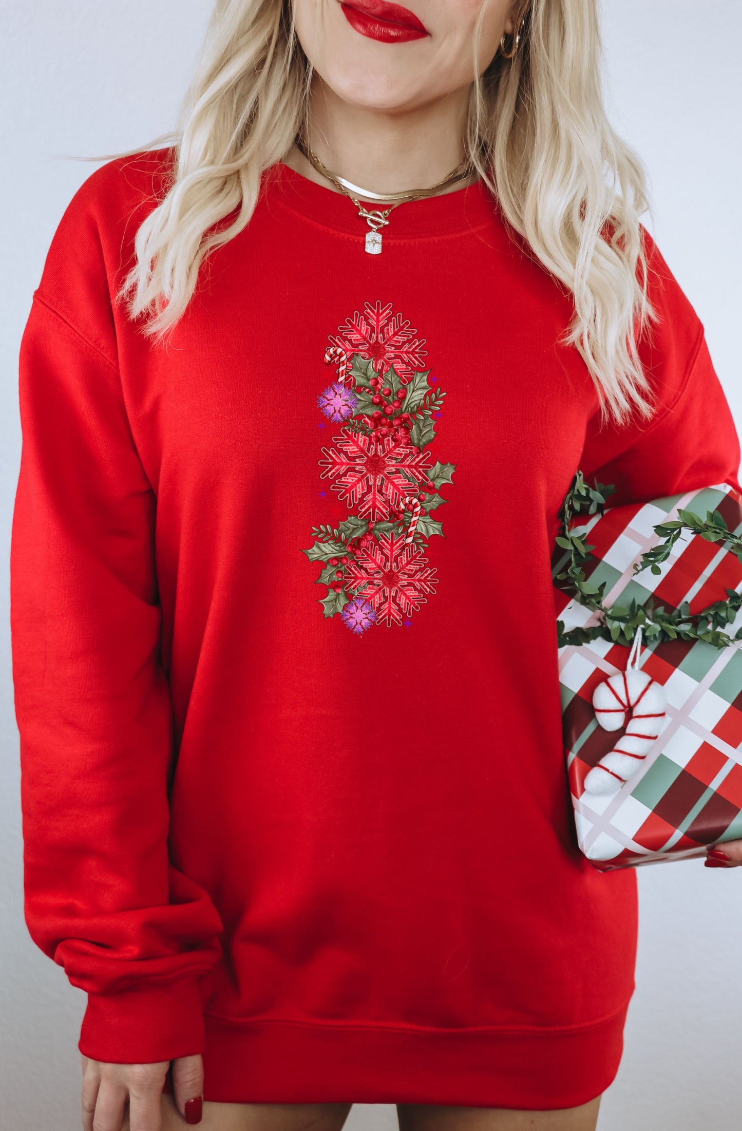 Festive Red Sweater with Intricate Floral Design