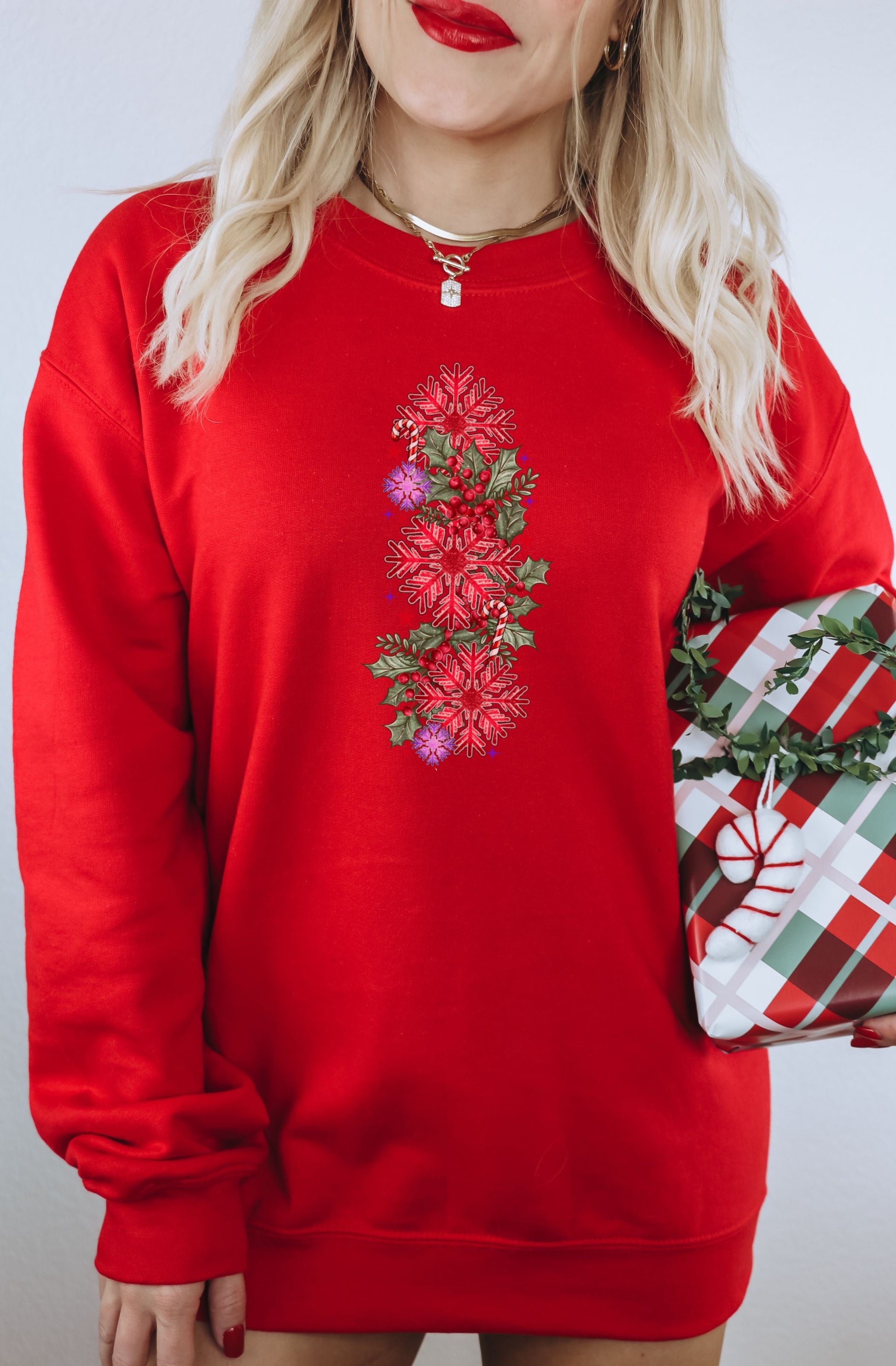 Festive Red Sweater with Intricate Floral Design