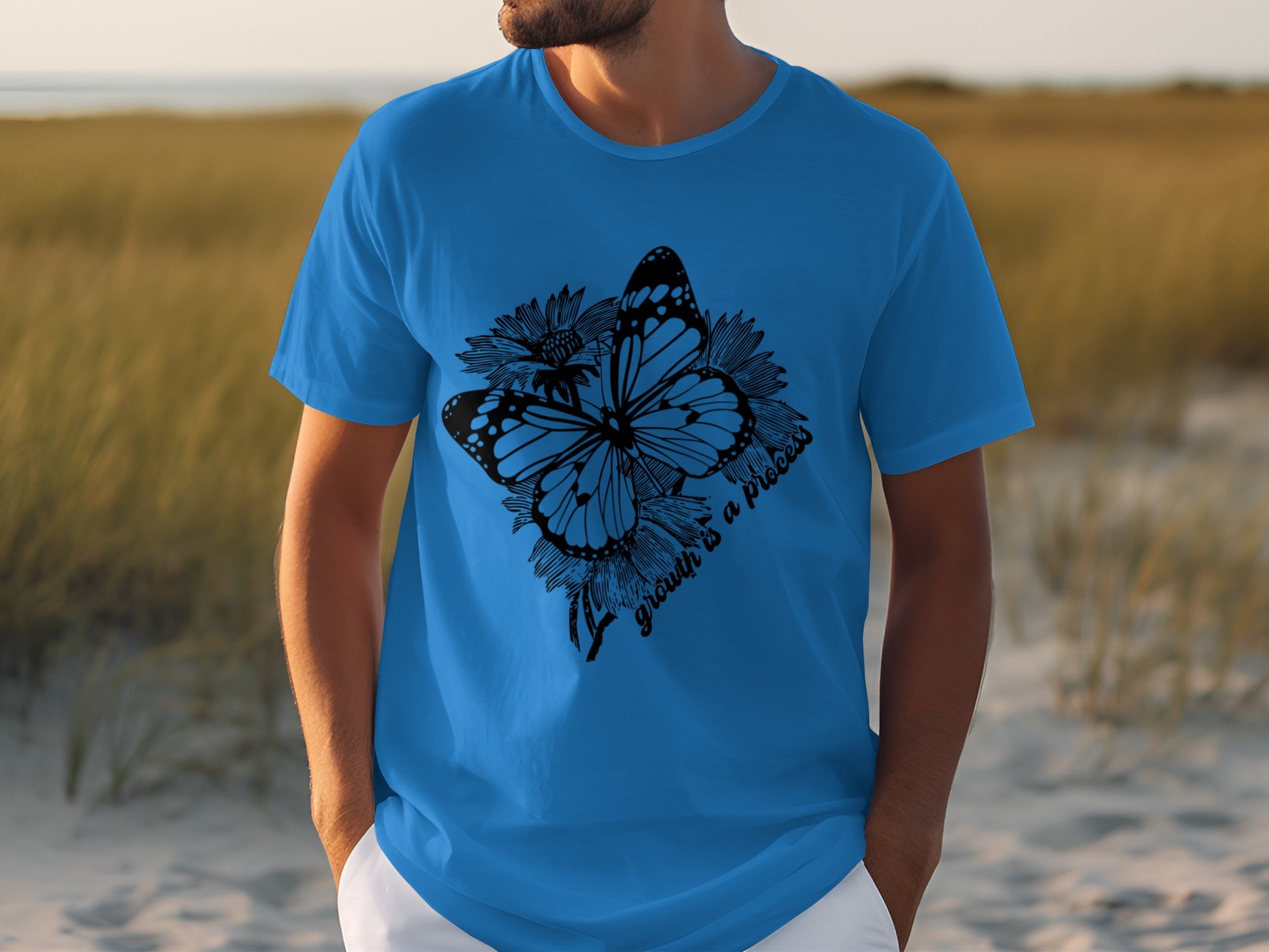Blue T-Shirt with Floral and Butterfly Graphic Design