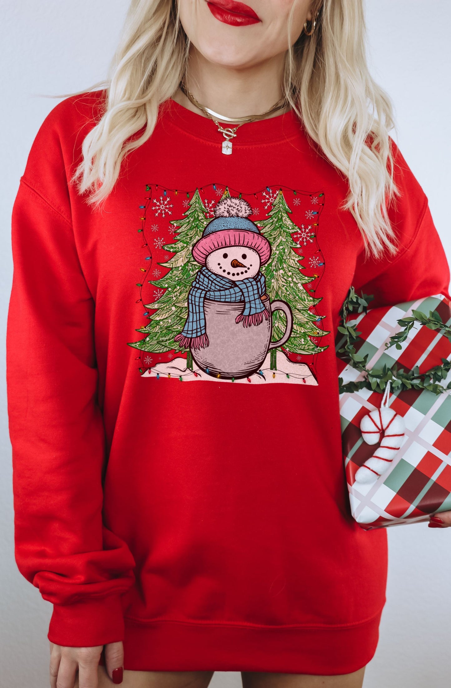 Festive Red Sweatshirt with Snowman in a Mug Design